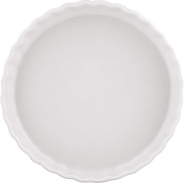 A white ceramic pie or tart dish with a scalloped rim, shown from a top-down view on a white background.